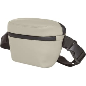 A beige bum bag with a black strap and accents, featuring a zippered compartment and a sleek design.