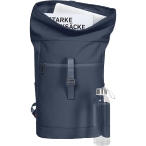 A navy laptop backpack with a roll-top, zip pocket, and a transparent drink bottle beside it.