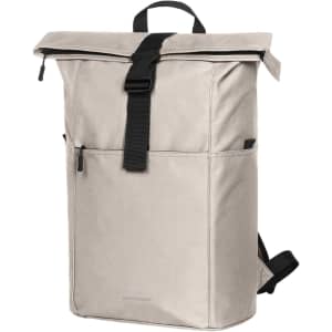 A light grey backpack with a roll-top closure, adjustable straps, and a front pocket. It features a logo.