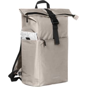 A beige Basic Backpack featuring a roll-top design, adjustable straps, and an outer pocket with a map.