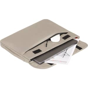 A beige laptop sleeve featuring an interior compartment, with a laptop, documents, and sunglasses visible.
