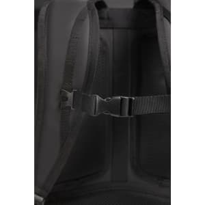 A black laptop backpack featuring adjustable straps and a securing buckle. The material has a textured, breathable design.