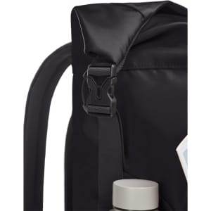 A black backpack featuring a clip closure and a drink bottle at its base. The backpack has a logo on it.