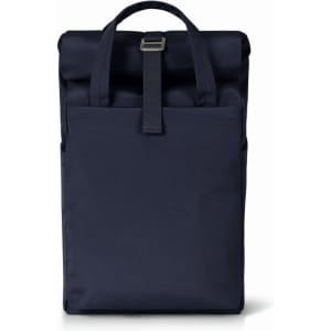 A navy blue Metro Backpack with a roll-top design and a strap. It features a branding logo on the front.