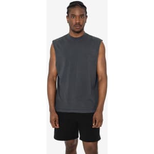 A sleeveless tee in dark grey, featuring a simple design, worn by a model with shorts. It has a logo.