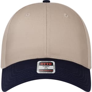 A beige and navy 6 panel low profile baseball cap with a logo on the front.