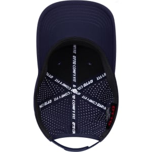 A navy blue 6-panel low profile perforated baseball cap with an inner patterned lining and a logo.