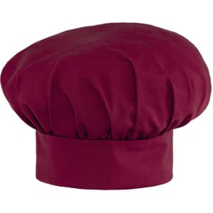 A maroon toque chef hat with a round, puffed design and a structured band at the base.