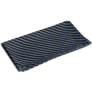 A neck scarf in navy blue with cream diagonal stripes, featuring a branded logo.