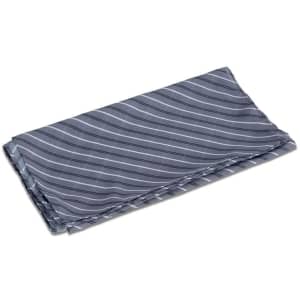 A folded neck scarf featuring blue and grey stripes, with a subtle pattern. It has a logo on one side.