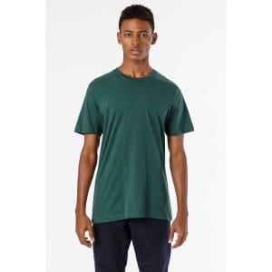 A green short sleeve fine jersey crew tee displayed on a model against a white background. The shirt has a logo.