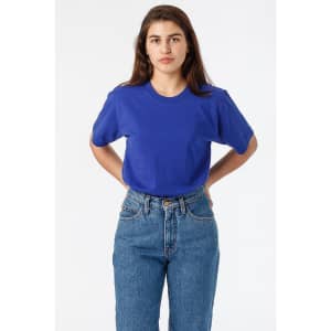 A blue short sleeve fine jersey crew tee displayed on a model, paired with high-waisted jeans.