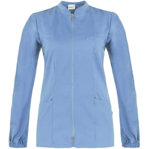 A light blue tunic with a zip front, long sleeves, and two front pockets. It features a simple design and branding.