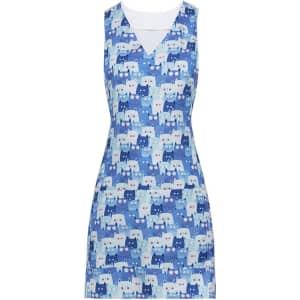 A blue apron featuring a playful pattern of cats in various shades, with a V-neck design and sleeveless style.