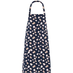 A navy apron with a cute pattern of animals against a light background. It features a neck loop and ties.