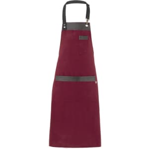 A maroon apron with a black strap and pockets, featuring a logo on one side.