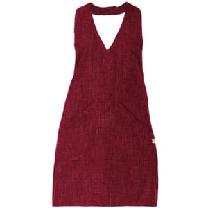 A maroon apron made from textured fabric with a deep V-neck and a front pocket, featuring a logo.