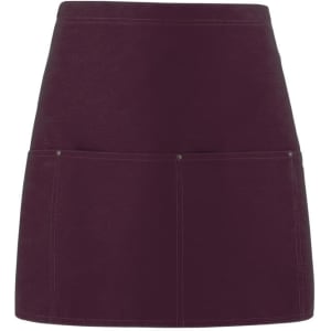 A maroon apron with two front pockets and a fitted design, featuring a subtle logo.