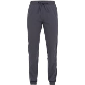Grey jogger pants with an elastic waistband and cuffs, featuring a drawstring for adjustment.