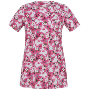 A pink tunic featuring a playful pattern of rabbits and flowers, with a side panel and short sleeves.
