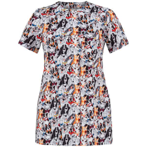 A short-sleeved tunic featuring a vibrant dog-themed print in various colours with a logo.