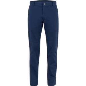 Navy blue pants with a fitted design, featuring a button and zip fly closure and a branded logo.