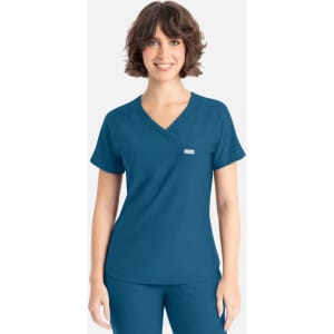 A teal Y-neck top with short sleeves, featuring a branding logo on the front.