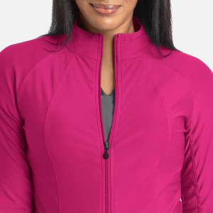A full zip track jacket in vibrant pink, featuring a high collar and a fitted design. It has a logo on the chest.