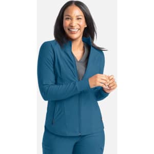 A full zip track jacket in teal, featuring a fitted design and zippered pockets, worn by a smiling woman.