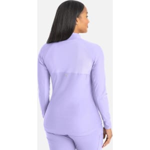 A full zip track jacket in lavender with a fitted design and a logo on the back.
