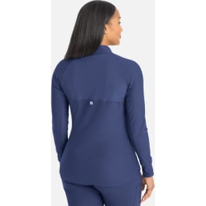 A navy full zip track jacket with a fitted design and long sleeves, featuring a small logo on the back.