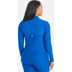 A blue full zip track jacket with a fitted design and a logo on the back. The model is facing away from the camera.