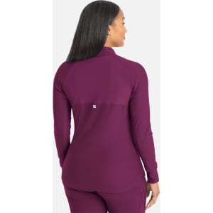 A full zip track jacket in deep plum with a fitted design and a branded logo on the back.