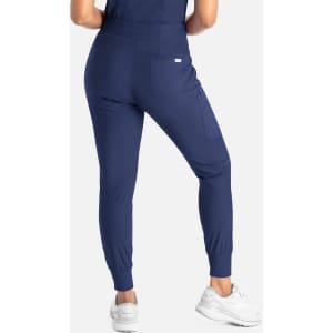 A pair of navy mid-rise joggers with a tapered fit and side pockets, featuring a small logo.