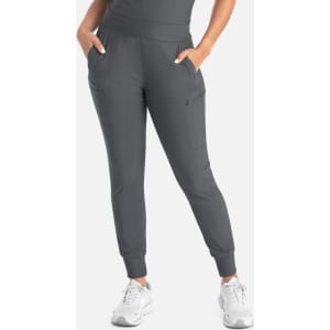 A grey mid-rise jogger with pockets, featuring a fitted waistband and cuffed ankles.