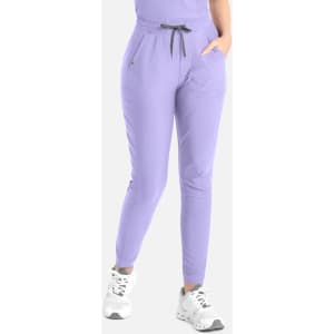 A pair of lilac tapered leg pants with pockets and an adjustable drawstring waist. Features a logo.