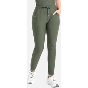 Olive green tapered leg pant featuring an elastic waistband, pockets, and a logo on the front.