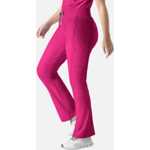 A pair of bright pink bootcut pants with an elastic waistband and side pockets. The pants have a logo on them.