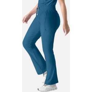 A pair of bootcut pants in teal with an elastic waistband and side pockets, featuring a logo.