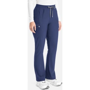A pair of navy bootcut pants with an elastic waistband and drawstring, featuring side pockets and a logo.