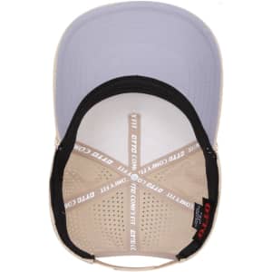 A perforated beige cap with a mid-profile, featuring a black interior and a curved brim. Branding is visible inside.