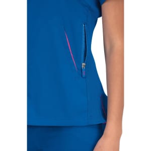 A blue top with a zippered pocket and pink accents, showcasing part of the sleeve and hand.