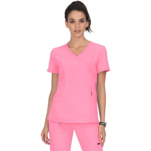 A pink scrub top with a wrap design, featuring short sleeves and side pockets. It has a branding logo.
