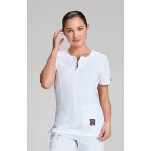 A white medical top featuring a zippered neck and two front pockets, with a logo on the side.