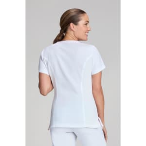 A white women's top, featuring a fitted design, viewed from the back, with a logo on the side.