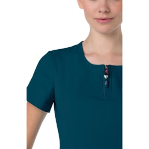 A teal women's top with a short zipper at the neckline, featuring short sleeves and a fitted design.