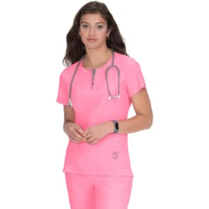 A healthcare top in vibrant pink, featuring a zippered neckline and a pocket, worn by a model with a stethoscope.