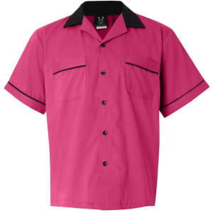 A pink bowling shirt with a black collar and trim, featuring two chest pockets and a logo.