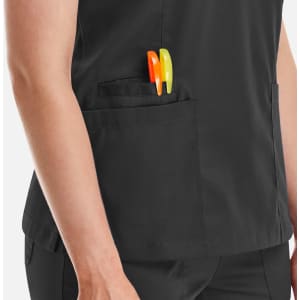 A women's black double V-neck top featuring a pocket with orange and green pens.