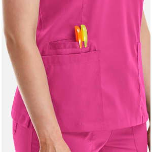 A pink women's double V-neck top with a pocket showing colourful pens.